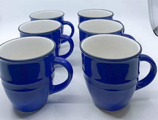 6 DARK BLUE MUGS W BLACK RIM.