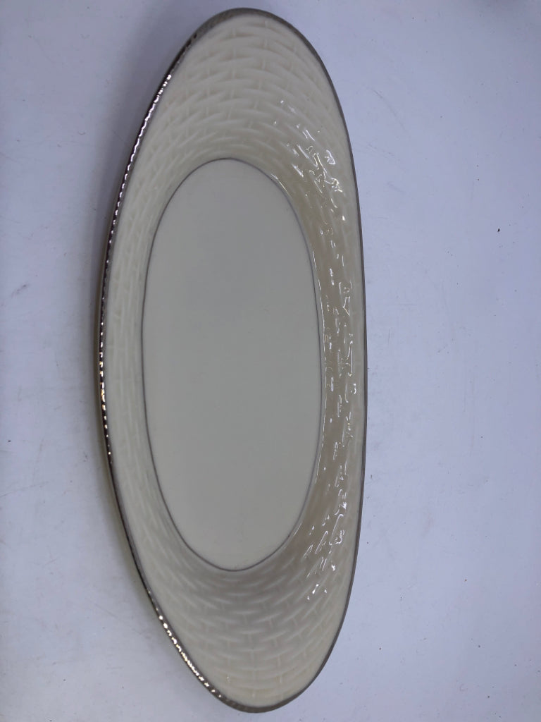 OVAL BASKET WEAVE DISH W/ SILVER EDGE.
