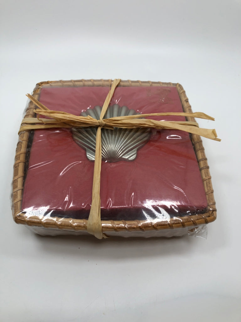 NIP RED SEASHELL PAPER NAPKINS IN BASKET.