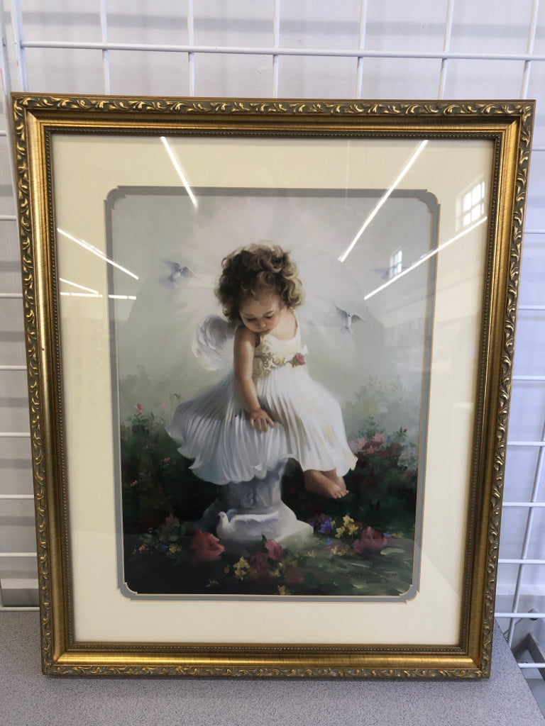 BABY ANGEL IN DRESS IN GOLD FRAME WALL HANGING.