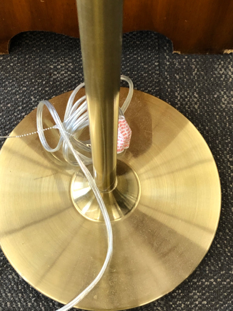 GOLD METAL BASE FLOOR LAMP W/ WHITE SHADE.