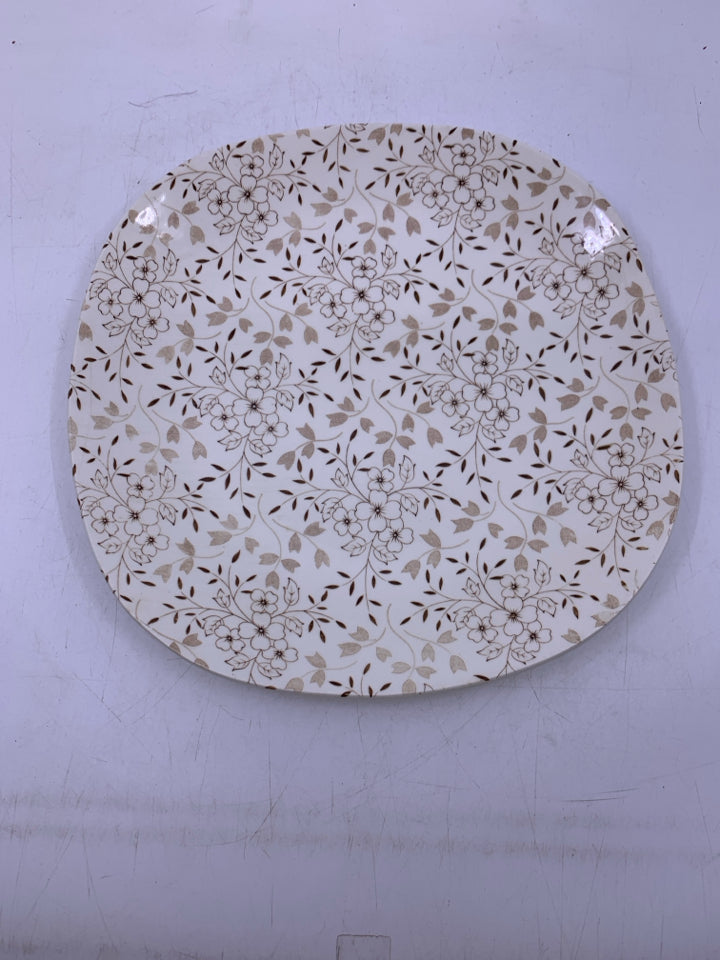 TAN FLORAL SQUARE ROUNDED PLATE.
