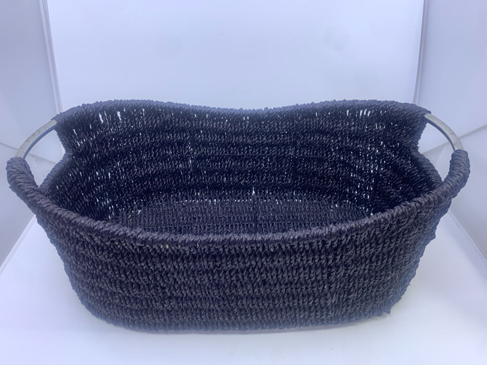 BLACK WOVEN OVAL BASKET W/ SILVER HANDLES.