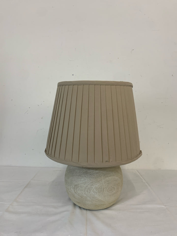 WHITE BASE AZTEC PATTERN LAMP W CREAM SHADE.