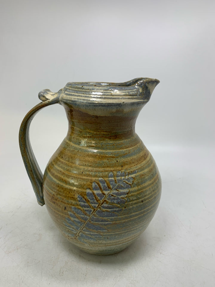 STRIPED POTTERY PITCHER W/ PRINTED FERN LEAF.