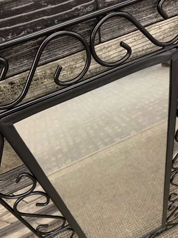 MIRROR W/ BLACK METAL FRAME WALL HANGING.