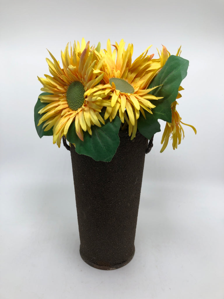 FAUX SUNFLOWERS IN PRIMITIVE METAL PLANTER.