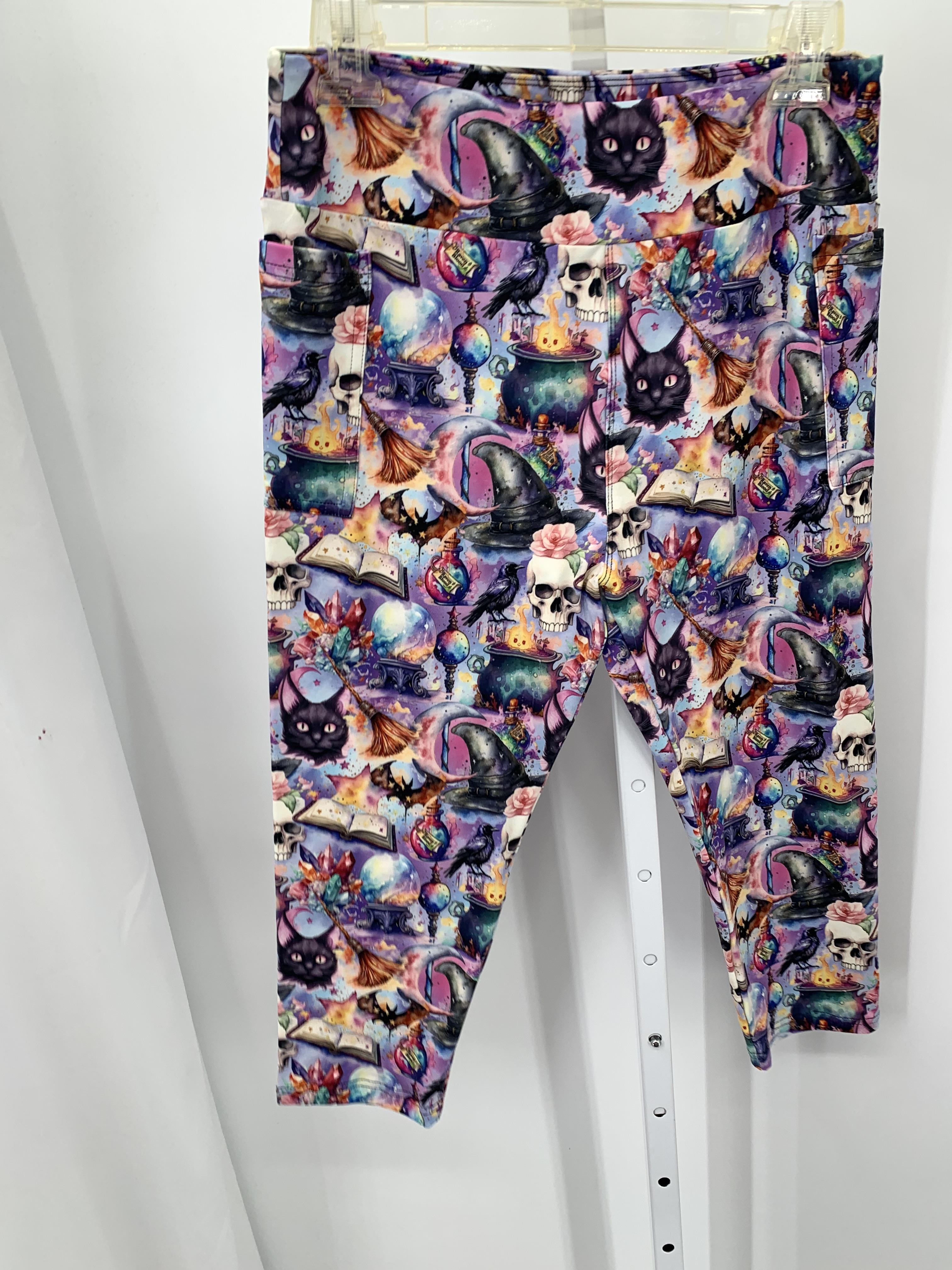 NWOT CAPRI LEGGINGS SPOOKY PATTERN.