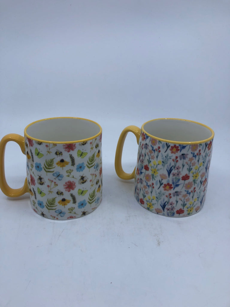 2 YELLOW RIMS ASSORTED FLOWERS/BEES MUGS.