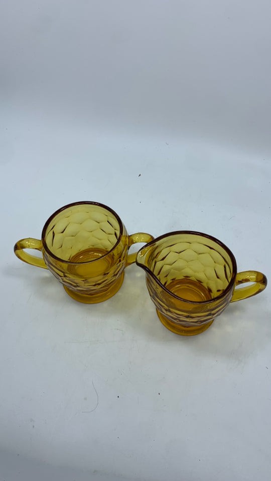 2PC AMBER GLASS SUGAR AND CREAMER SET.