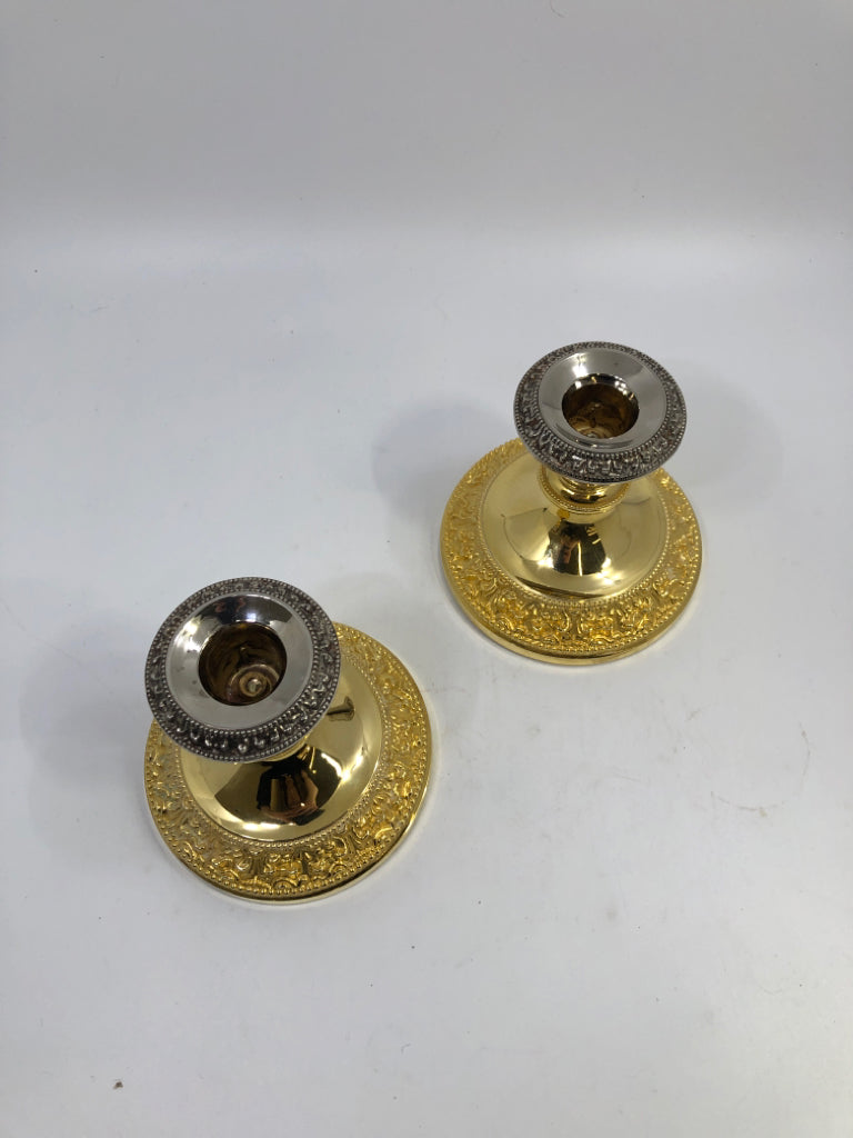 2PC GOLD & SILVER CANDLE HOLDERS.
