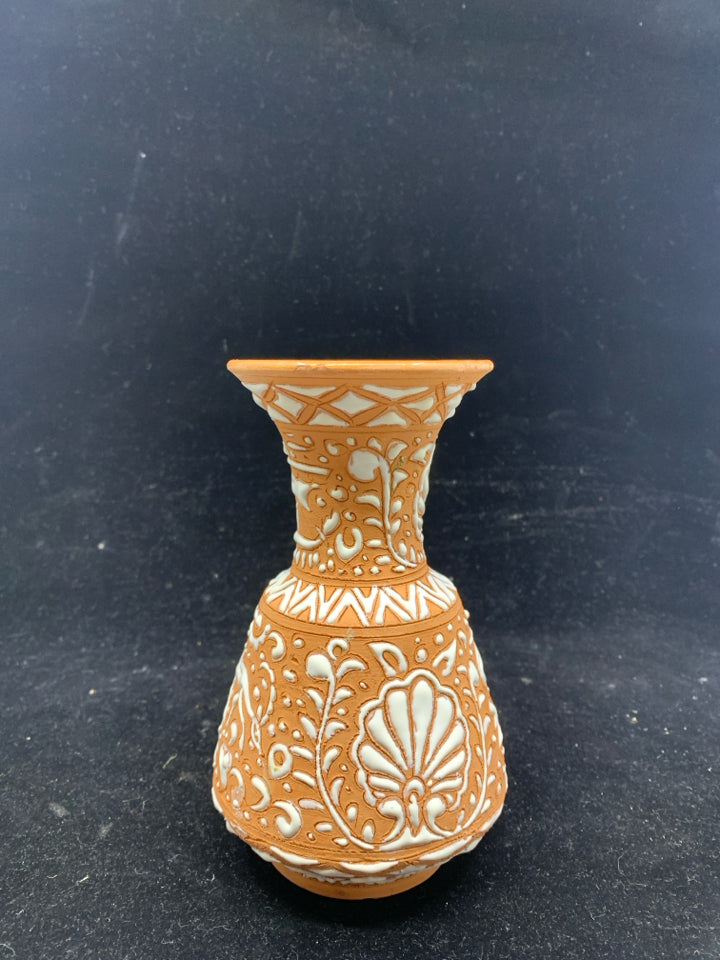 TERRA COTTA EMBOSSED W WHITE VASE.