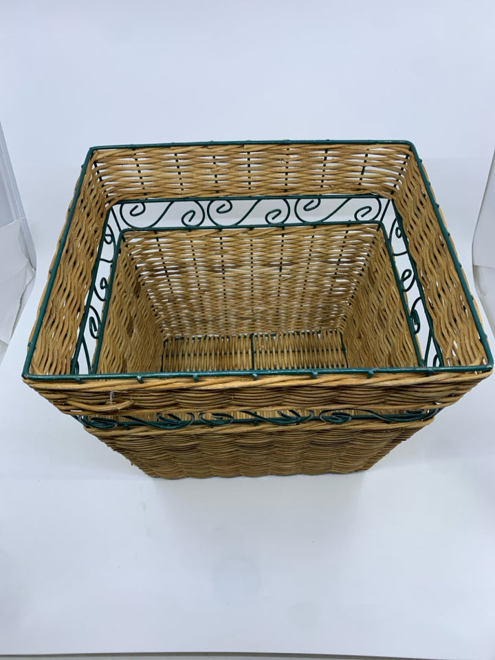 BLONDE WOVEN SQUARE TRASH CAN W/ GREEN METAL DETAIL.