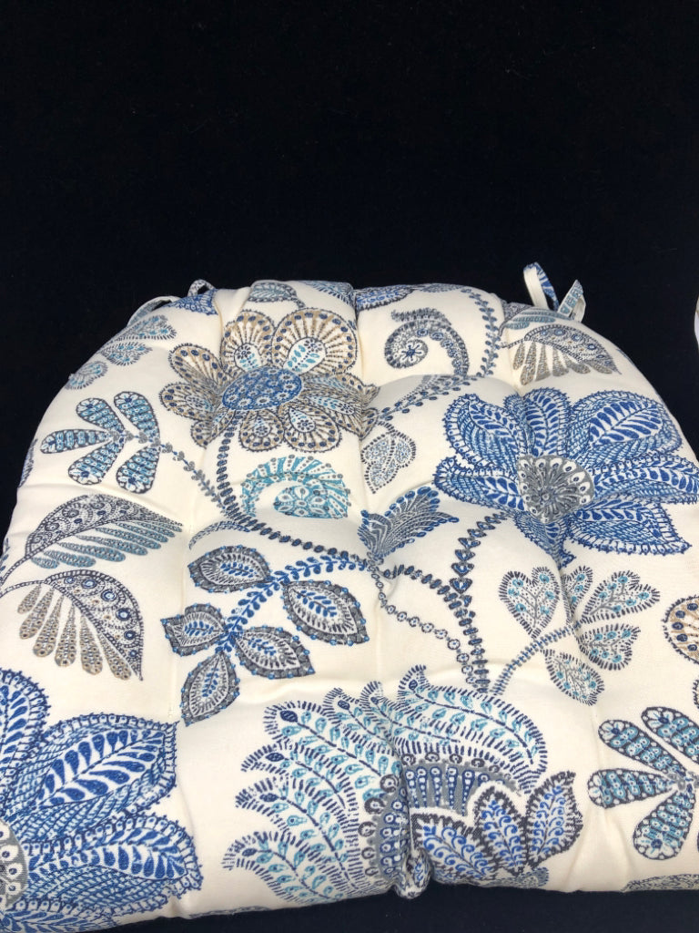 WHITE, BLUE, & GRAY FLORAL SEAT COVER.
