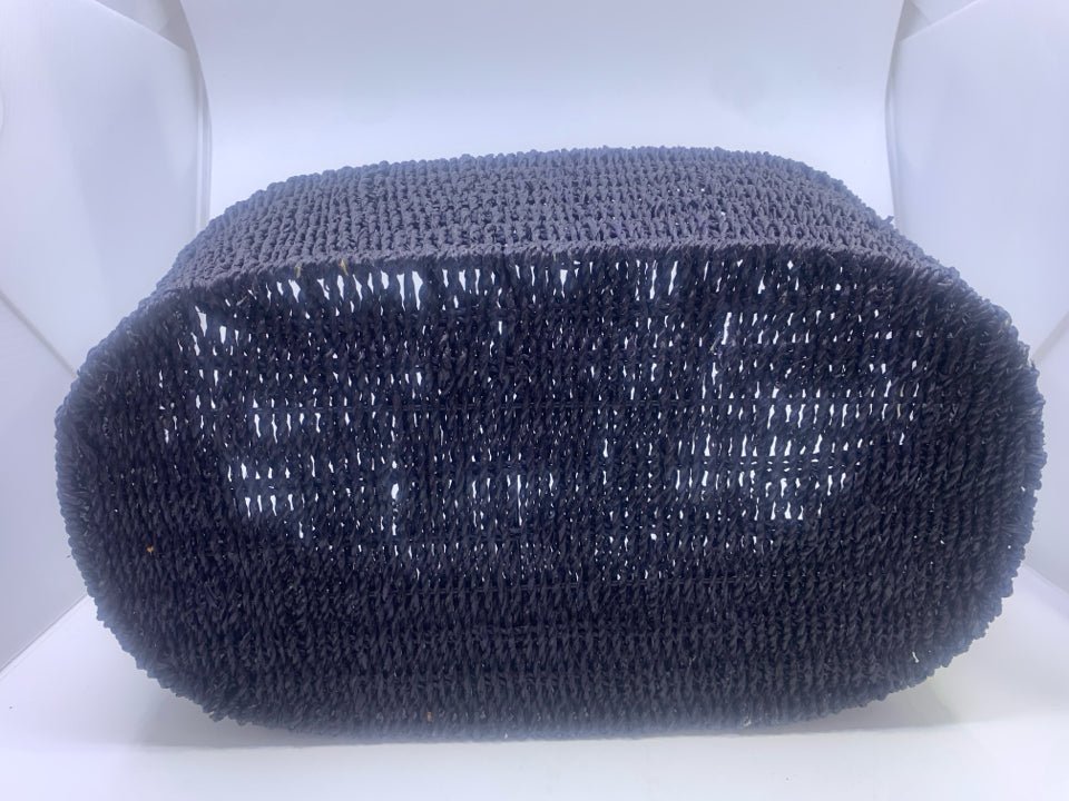 BLACK WOVEN OVAL BASKET W/ SILVER HANDLES.