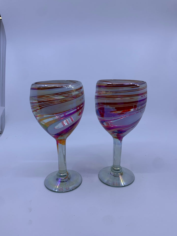 2 RED AND WHITE BLOWN GLASS WINE GLASSES.