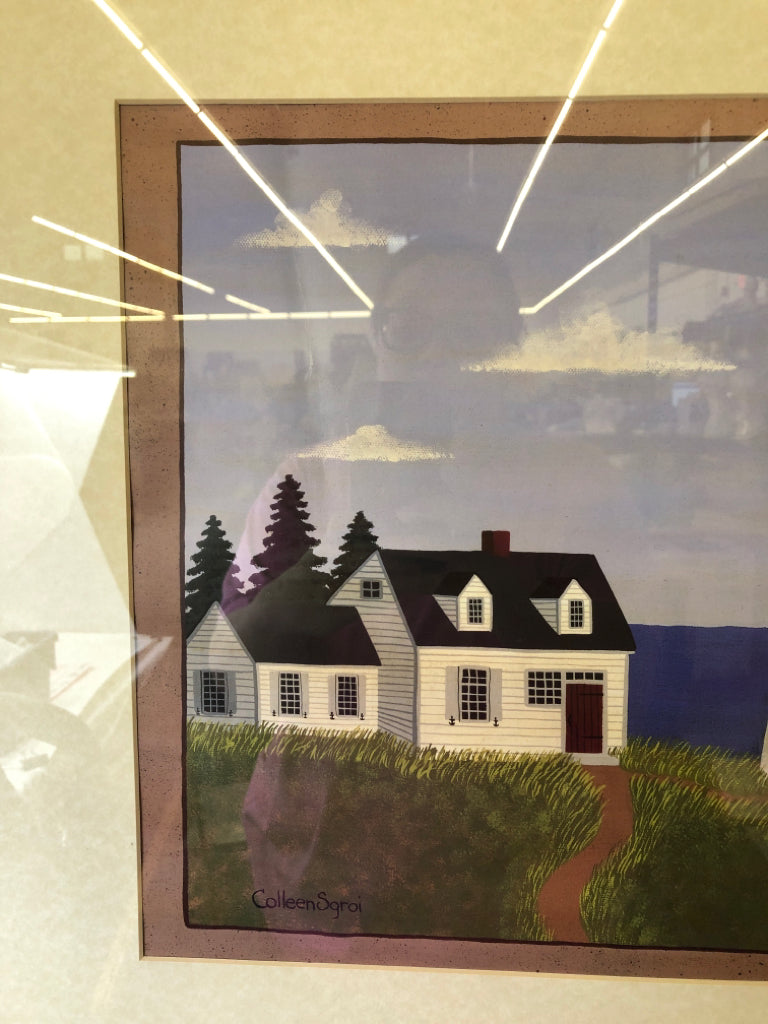 LIGHTHOUSE NEXT TO A WHITE HOUSE ON THE WATER WALL ART.