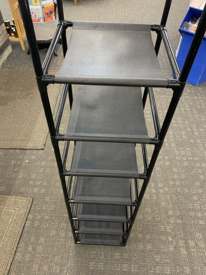 10 TIER VERTICAL PLASTIC/FABRIC SHOE RACK.