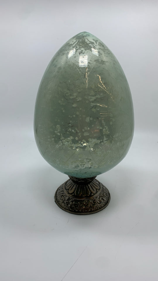 IRIDESCENT BLUE EGG ON SILVER SHELF DECOR.