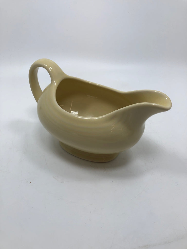 FIESTAWARE CREAM COLORED GRAVY BOAT.