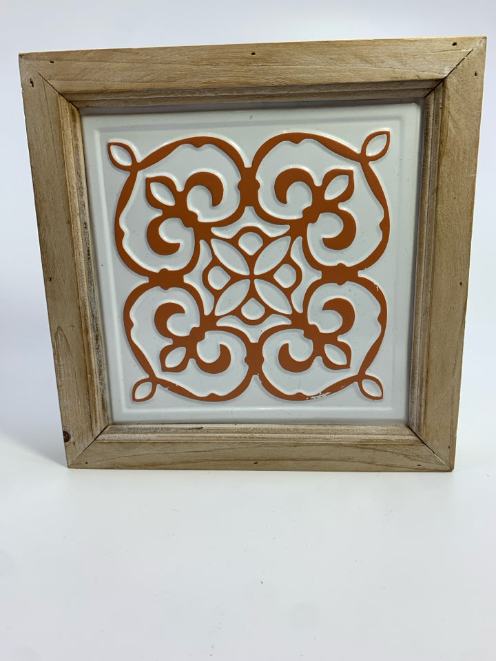 WHITE/PEACH DESIGN METAL TILE IN BLONDE WOOD FRAME.