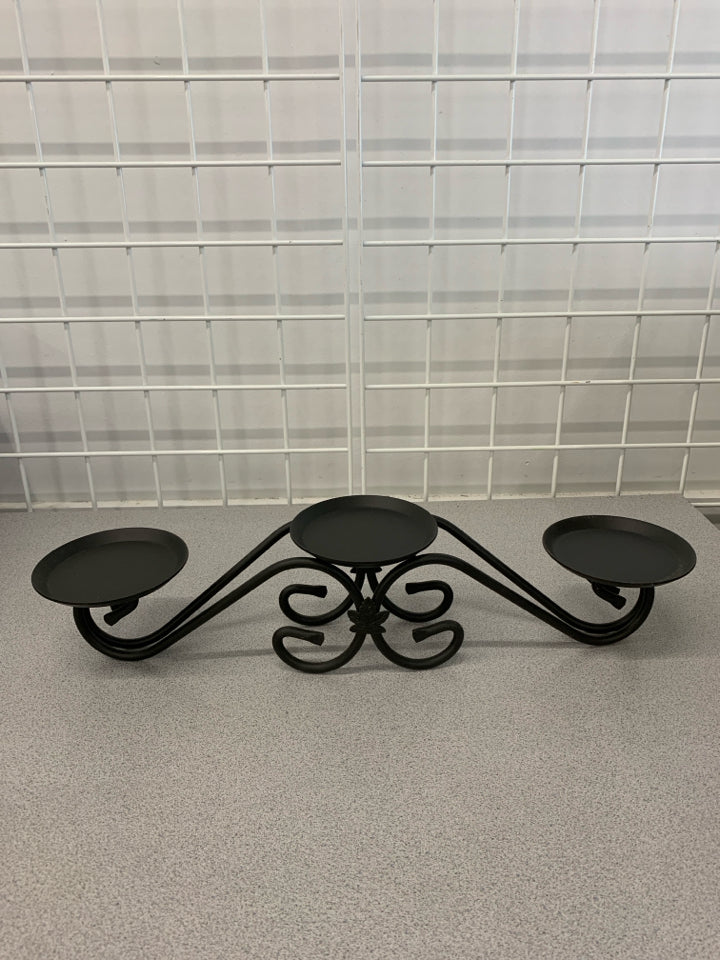3 TIER PILLAR WROUGHT IRON CANDLE HOLDER.