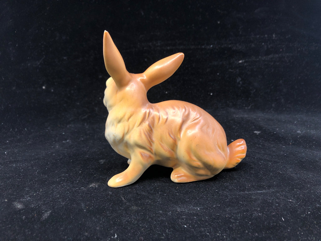 VTG TAN CERAMIC BUNNY FIGURE.