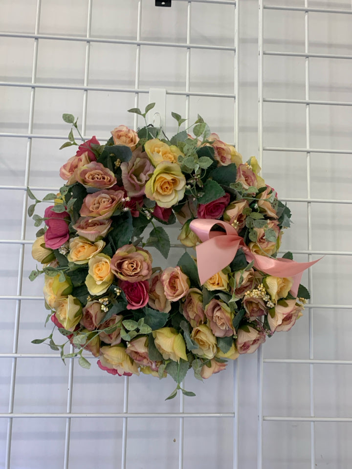 PINK AND YELLOW FLORAL WREATH.