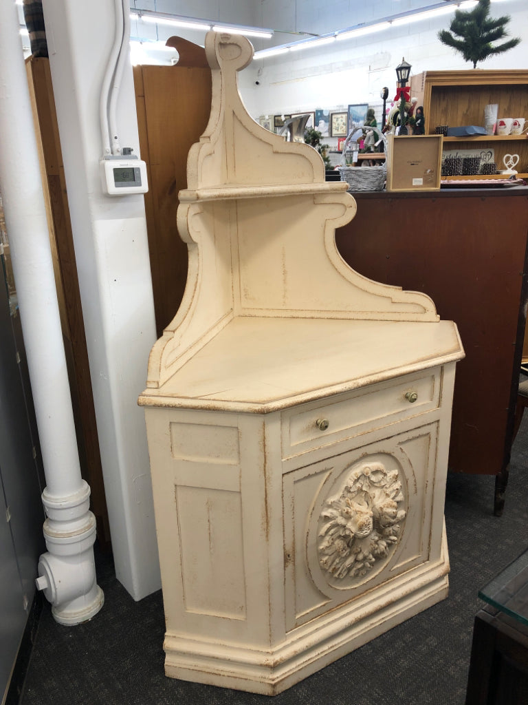 DISTRESSED CREAM CORNER HUTCH W DRAWER AND CABINET.