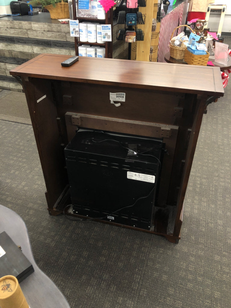 DARK WOOD ELECTRIC FIREPLACE.