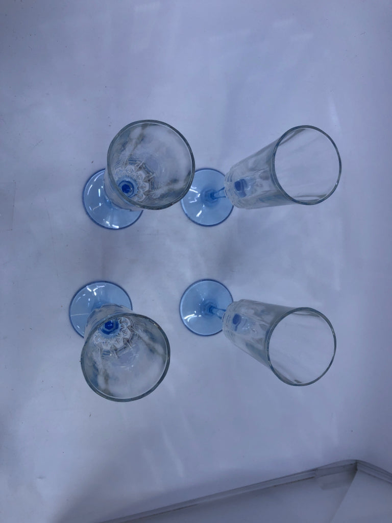 5 BLUE STEM CUT GLASS CHAMPAGNE FLUTES.
