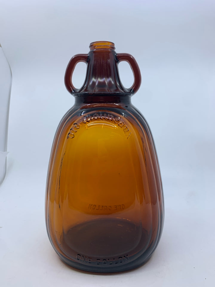 BROWN GLASS BOTTLE 2 HANDLES.