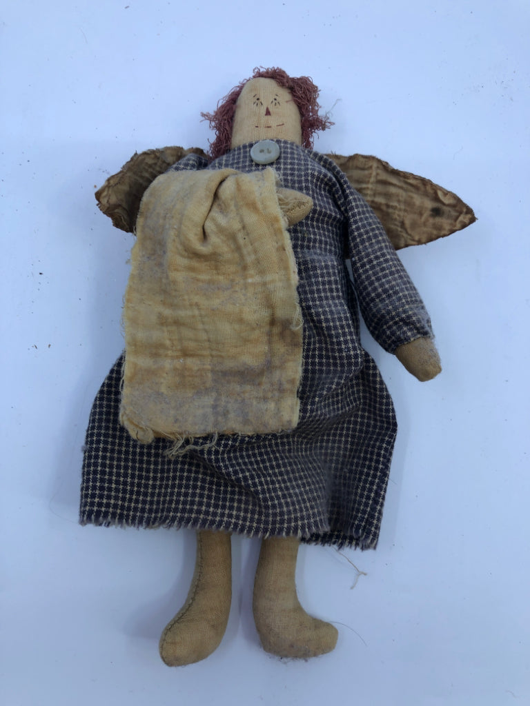 PRIMITIVE ANGEL IN BLUE AND WHITE DRESS.