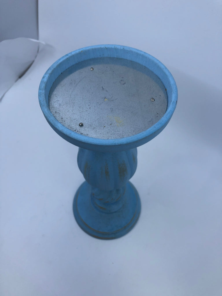 LIGHT BLUE PILLAR CANDLE HOLDER.