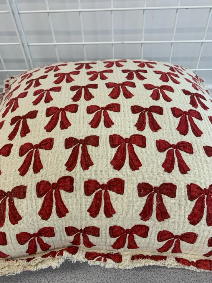 RED BOW PILLOW.