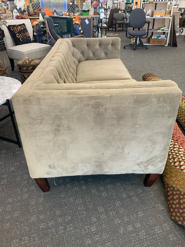 TAN RECTANGLE TUFTED COUCH.