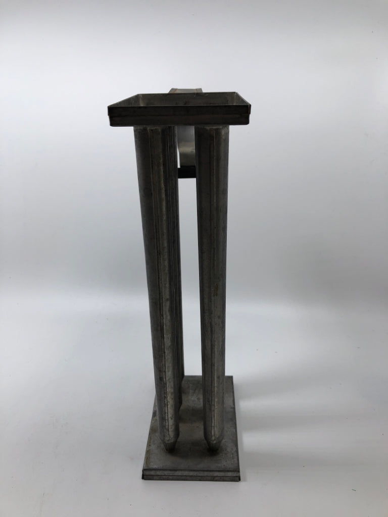 VTG METAL MULTI-TUBE TAPER CANDLE MOLD.