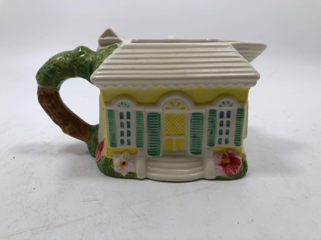 YELLOW COTTAGE W/PLANTS CREAMER.