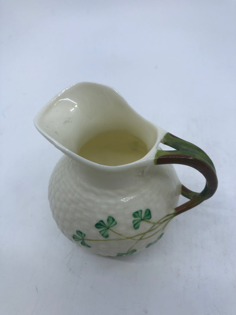 BELLEEK BASKET WEAVE PATTERN W/ SHAMROCKS CREAMER.