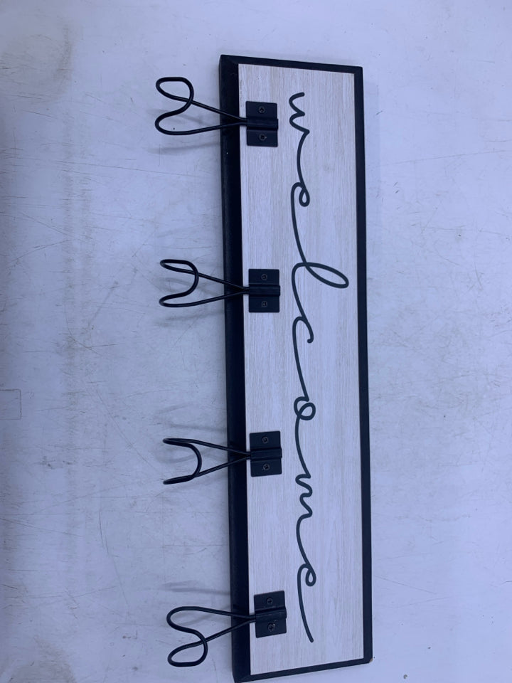 BLACK/WHITE WELCOME W/ 4 METAL HOOKS.