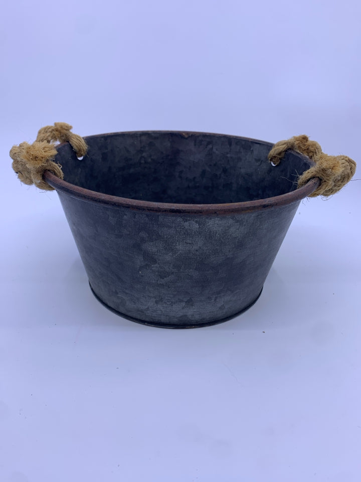 METAL BUCKET W ROPE HANDLES.