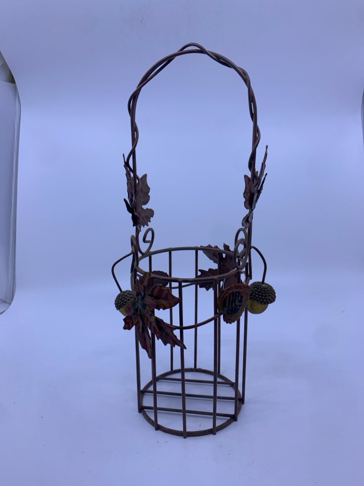 BROWN METAL WINE BOTTLE HOLDER W HANDLES AND ACORNS.