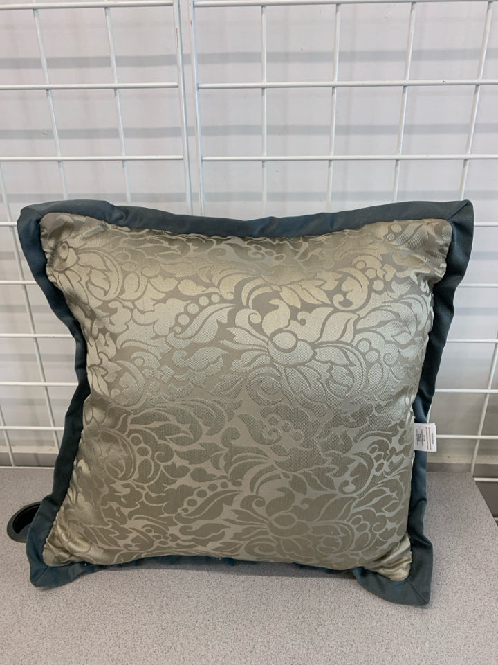 BLUE TEXTURED PILLOW.