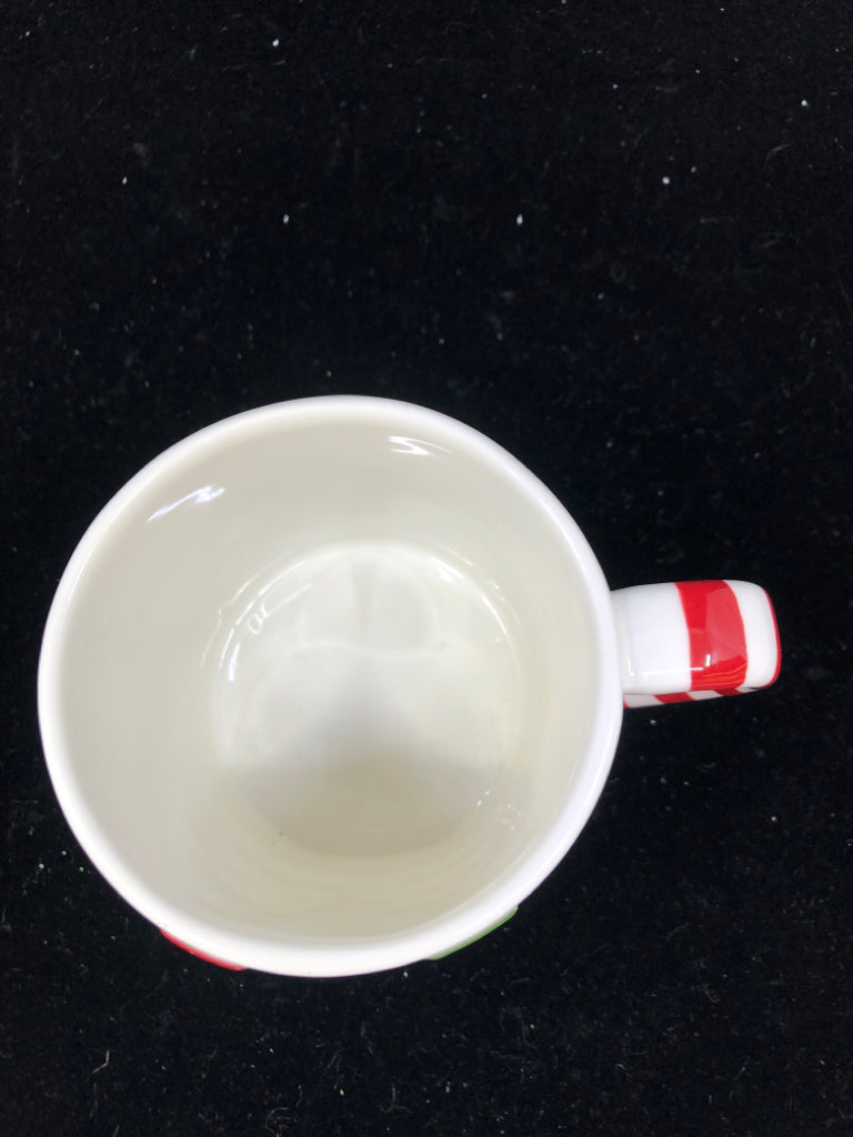 EMBOSSED NUT CRACKER MUG.