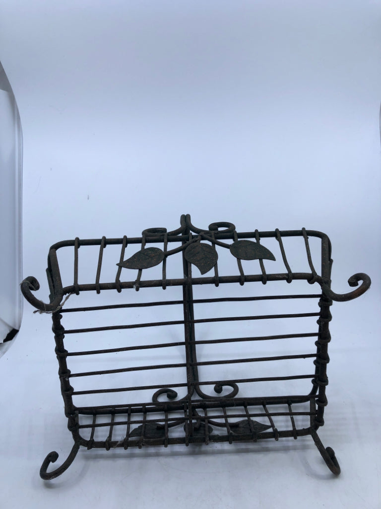 GREEN METAL BASKET.