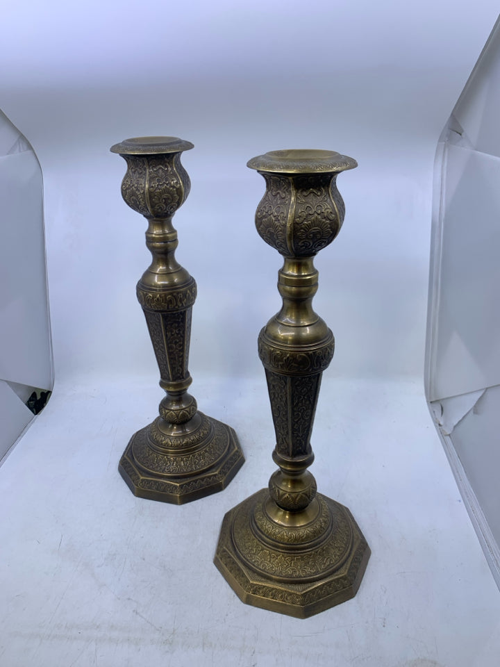 2 HEAVY ORNATE DETAILED METAL TAPERED CANDLE HOLDERS.