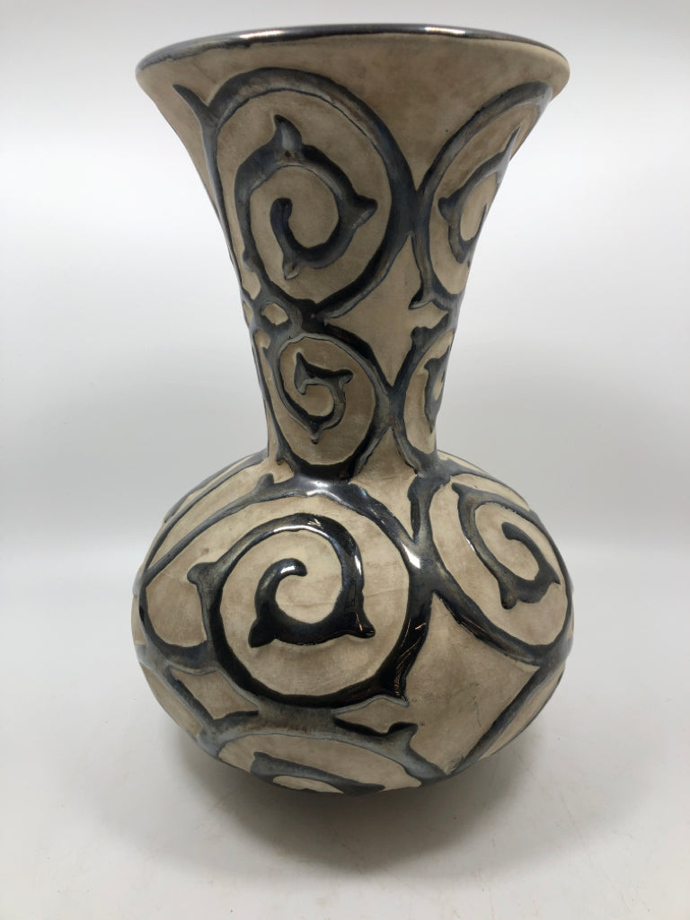 BLACK SWIRLED STONEWARE VASE.