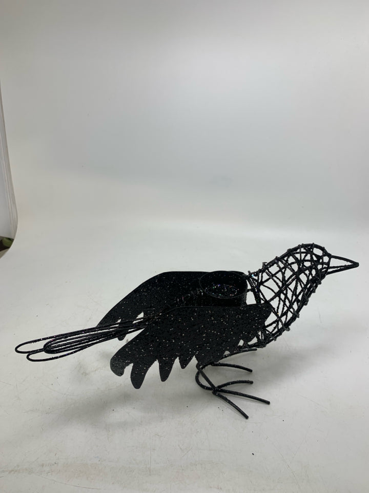 BLACK SPARKLE CROW TEA LIGHT HOLDER.