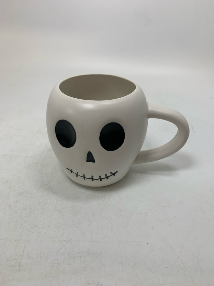 WHITE SKULL HEAD MUG.