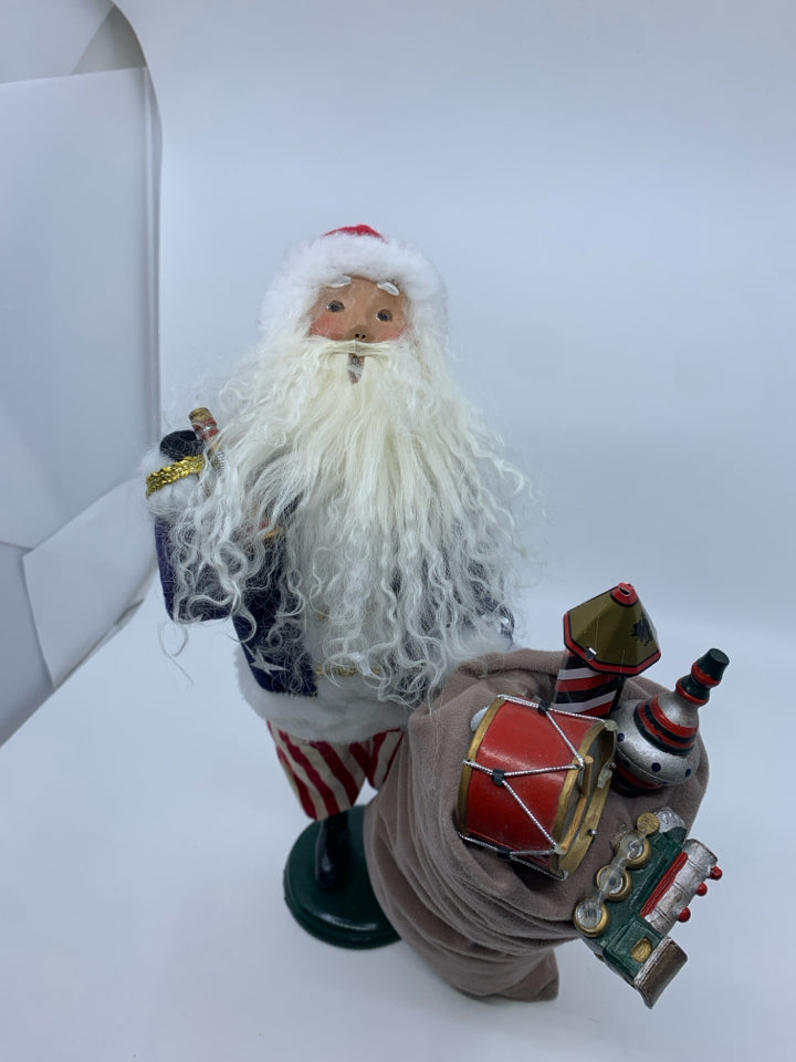 BYERS' CHOICE PATRIOTIC SANTA W TOYS.